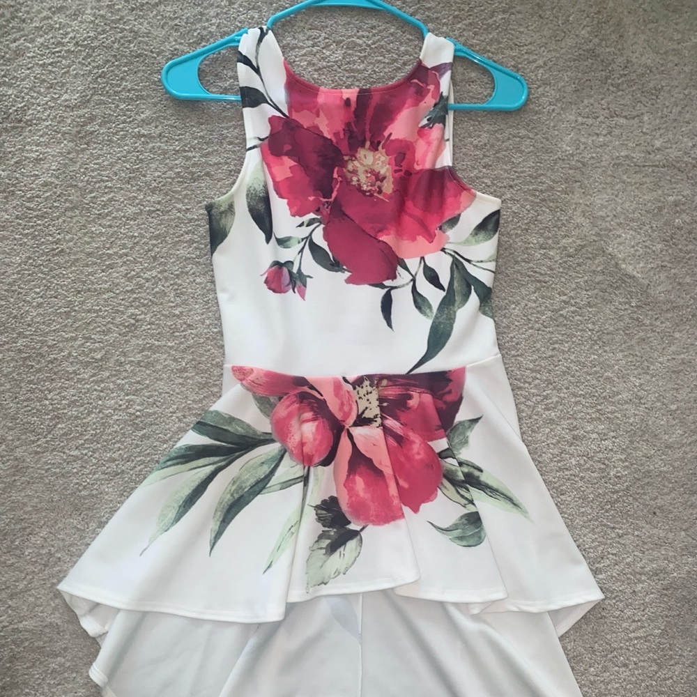 Peplum top with long back